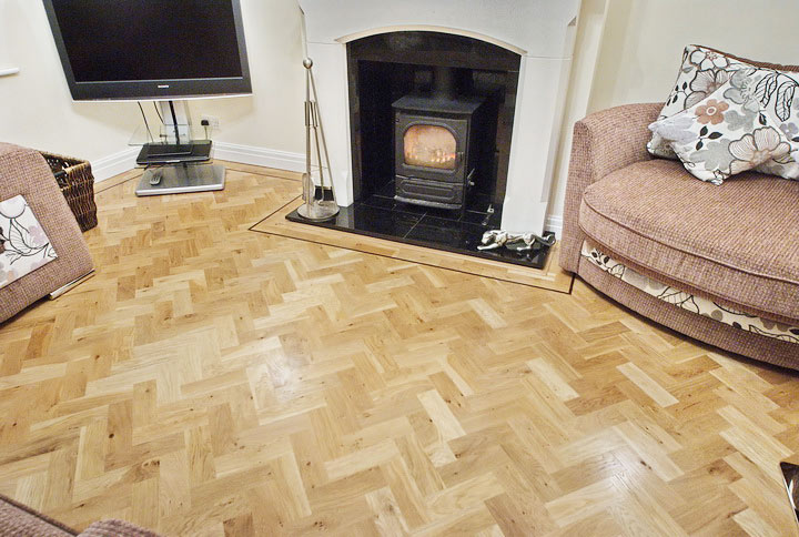 rustic parquet floor with wenge single strip border fireplace.jpg